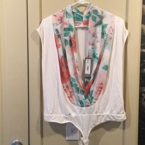 Eva mended New York and company unitard blouse